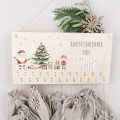 Adventskalender aus Holz mit Schnur und Säckchen