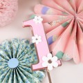 Cake Topper zum 1. Geburtstag in Rosa mit weißen Gänseblümchen auf Torte